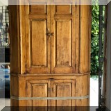 F49. Pine corner cabinet. 